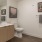a bathroom with a toilet and a sink