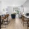 a dining room with a wood floor
