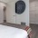 a bedroom with a bed and large closet