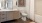 a bathroom with a toilet and bathtub