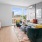 a living room with large windows