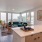 a kitchen with a couch and a sink