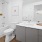 a bathroom with a tub toilet and sink