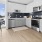 a kitchen with a large window
