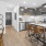 a kitchen with a table and chairs