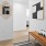 a room with a bench and a mirror