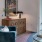 a living room with a blue chair