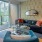 a living room with a large mirror